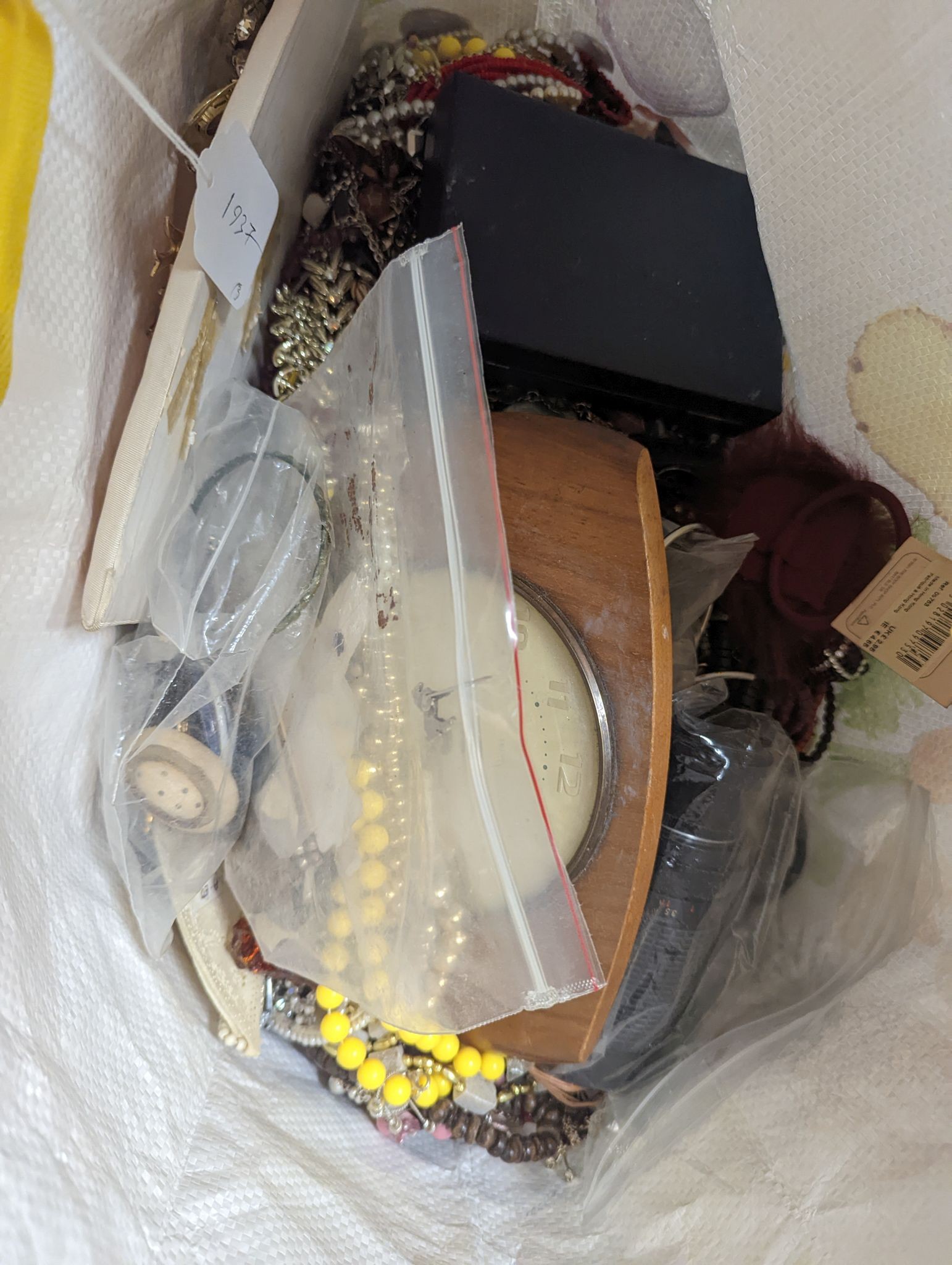 Three large bags of vintage costume jewellery.